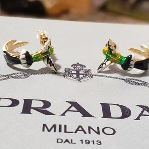 Gold bird hoop earrings